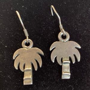Sterling Silver palmetto tree earrings with the 925 mark.